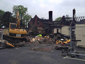 Supporting image for story: Demolition starts on Shropshire pub destroyed in blaze