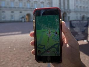Supporting image for story: Taiwanese 70-year-old makes device to play Pokemon Go with 12 phones at once