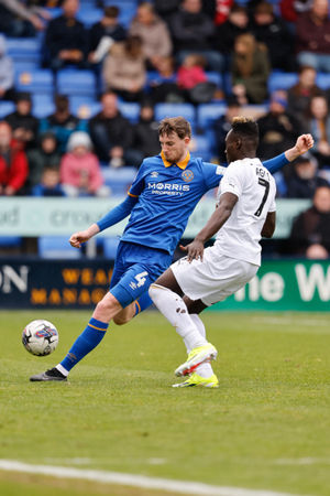 Joe Anderson of Shrewsbury Town and Dan Agyei of Leyton Orient (AMA)