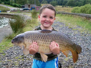 Supporting image for story: Birthday boy, five, lands a massive 23lb carp