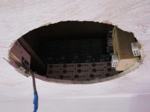 Supporting image for story: Black Country shop owner loses licence after cigarettes found hidden in ceiling