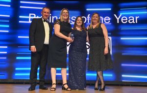Business of the Year Award presented by Alan Harris of sponsor Voestalpine Metsec plc, to winners Walsave Credit Union Ltd