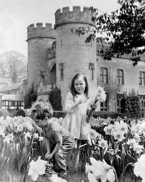 The castle in May 1970 with Edward Lennox, and his sister Arabella, who lived there at the time, picking daffodils.