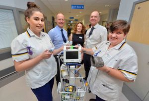 Student nurses Chantal Harding and Caragh Knott, both from Shrewsbury, are pictured with Wolverhampton University Vice Chancellor Professor Geoff Layer, SaTH's chief executive Simon Wright and Dr Jenni Rowlands, director of medical education