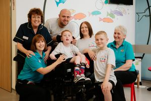 From left, Jacqueline Hyne, Macmillan paediatric oncology nurse, Dawn Walder, play specialist, Andy Finazzi, Liam Finazzi, Kerry Finazzi, Callum Finazzi and Lisa Harries, play specialist, at Princess Royal Hospital in Telford








