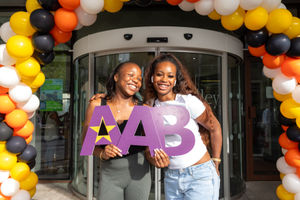 Keren Moponda and sister Ketia celebrate at  Dudley 6th 