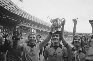 Wolverhampton Wanderers players with the trophy after beating Manchester City in the Football League Cup Final at Wembley Stadium, London, 23rd February 1974. Left to right: Derek Dougan, Mike Bailey (captain), John Richards and Gary Pierce. Wolves won the match 2-1 .