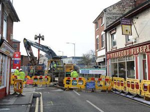 Supporting image for story: Road closed by sewer collapse