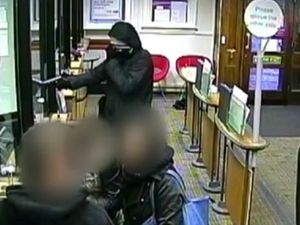 Supporting image for story: £10k reward to find 'casual' armed bank robber