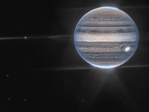 Supporting image for story: New space telescope shows Jupiter’s auroras and tiny moons