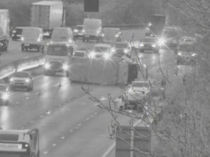 Supporting image for story: Drivers warned to 'expect delays' as three lanes of the M5 closed after van overturns on motorway leaving one with 'potentially serious injuries'