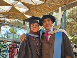 Supporting image for story: Father and daughter graduate together from the same university