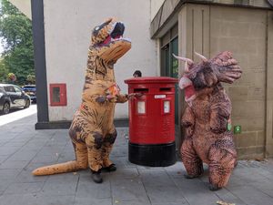 Supporting image for story: 'Dinosaurs' protest against Shropshire pension fund's fossil fuel investment