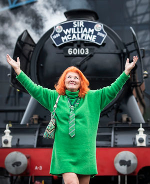 Lady Judy McAlpine stands in front of the Flying Scotsman as it prepared to make a memorial trip from London King's Cross to York in 2019 in honour of Sir William McAlpine