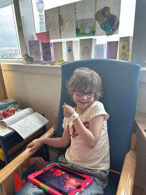 Dulcie gives a thumbs up as she goes into isolation. Picture: Debbie O'Kelly