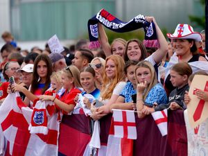 Supporting image for story: Football comes home: Jubilant fans greet Lionesses on return to England