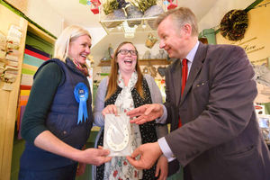 Michael Gove buys Conservative candidate Amanda Milling a lucky horseshoe at Gemma Pratt's flower shop in Rugeley