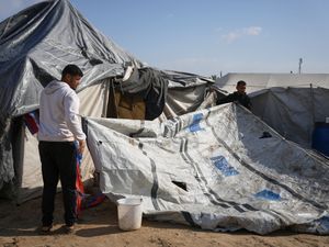 Supporting image for story: First strong winter rains soak Gaza’s makeshift shelters