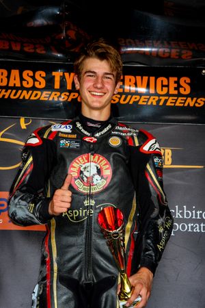 Harris is all smiles after making the top step. Picture: Colin Port Images
