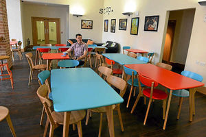 'stop.' cafes co-owner Mike Dalton pictured in a new branch of the cafe opening at the Museum and Art Gallery