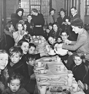 A tea party for London evacuees in Wolverhampton in November 1940. 