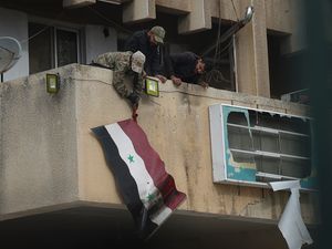 Supporting image for story: Syrian insurgents say they have entered the capital Damascus