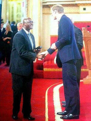 Joe Jackson meeting the Duke of Cambridge to receive his honour
