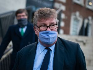 Crispin Odey wearing a face mask