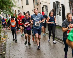 More runners brave the steep Cartway in the first mile of last year's race.