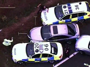 Supporting image for story: Caught on camera: Two jailed after heroin worth £200k thrown from car at 100mph in M6 police chase