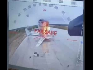 Supporting image for story: Ukraine says it destroyed more than 40 military planes in drone attack in Russia