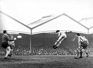 Heading ball Wolves player Jimmy Murray