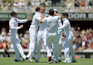 England's Stuart Broad (centre) celebrates taking the wicket of Australia's Chris Rogers (not pictured)