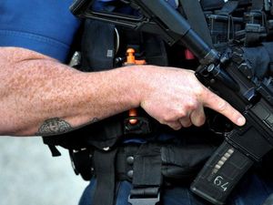 Supporting image for story: Met Police firearms officers issued with head mounted cameras