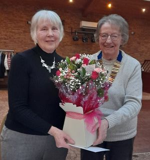 After presentation of Club Regalia, to new Chairman Chris Ballett; outgoing Chairman,
Anne Bumford, received flowers as
appreciation from members (L to R)