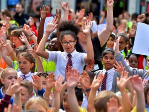 Supporting image for story: Hundreds of children pack out city square to sing in music-making celebration