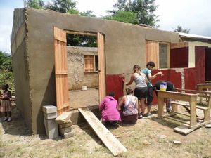 The students help paint classrooms.