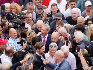 Supporting image for story: In Pictures: Farage doused while Starmer and Sunak prepare for first TV debate