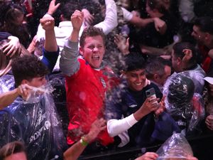 Supporting image for story: England fans in party mood after cruising to victory against Wales in World Cup