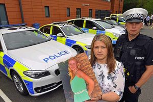 Lisa Thomas is pictured with a picture of Laura, and Central Motorway Police Group Inspector Sion Hathaway