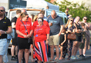 People line the pavement, as they wait for Andy.