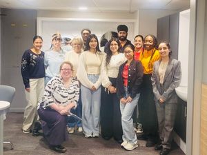 Supporting image for story: Local opticians puts charity in the frame