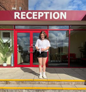 Student opening her results.