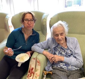 Biking Belles enjoying a chat with residents 