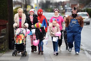 The family walked through Brownhills and Pelsall with buckets