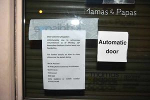 The liquidation notice outside the shop