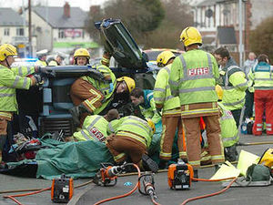 Supporting image for story: Driver cut free from car as vehicle overturns