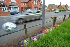 Flowers at the scene of the crash on Prestwood Road