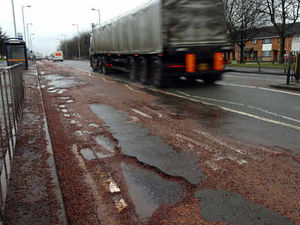 Supporting image for story: Council bill for pothole damage up to £16,000