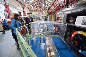 The Culture Secretary trying some of the exhibits at the Enginuity museum.